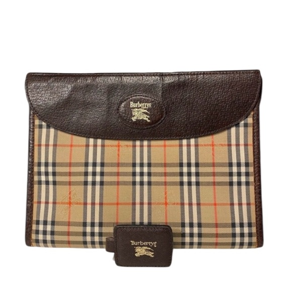 Burberry Handbags - Burberrys Vintage Haymarket Check Clutch w/matching hang tag. Pre 1999.